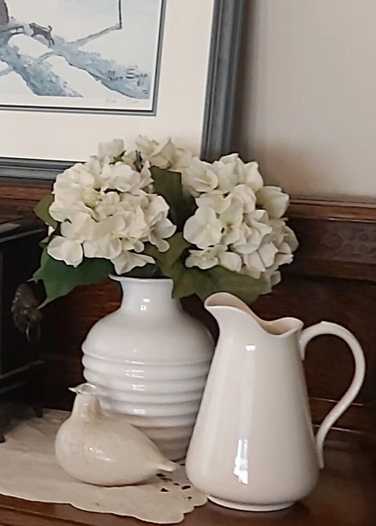 Simple White Farmhouse Decor - White Pitcher, Vase, White Flowers and White Finnish Toikka Bird